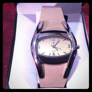 P silver tone oval face beige band buckle watch.